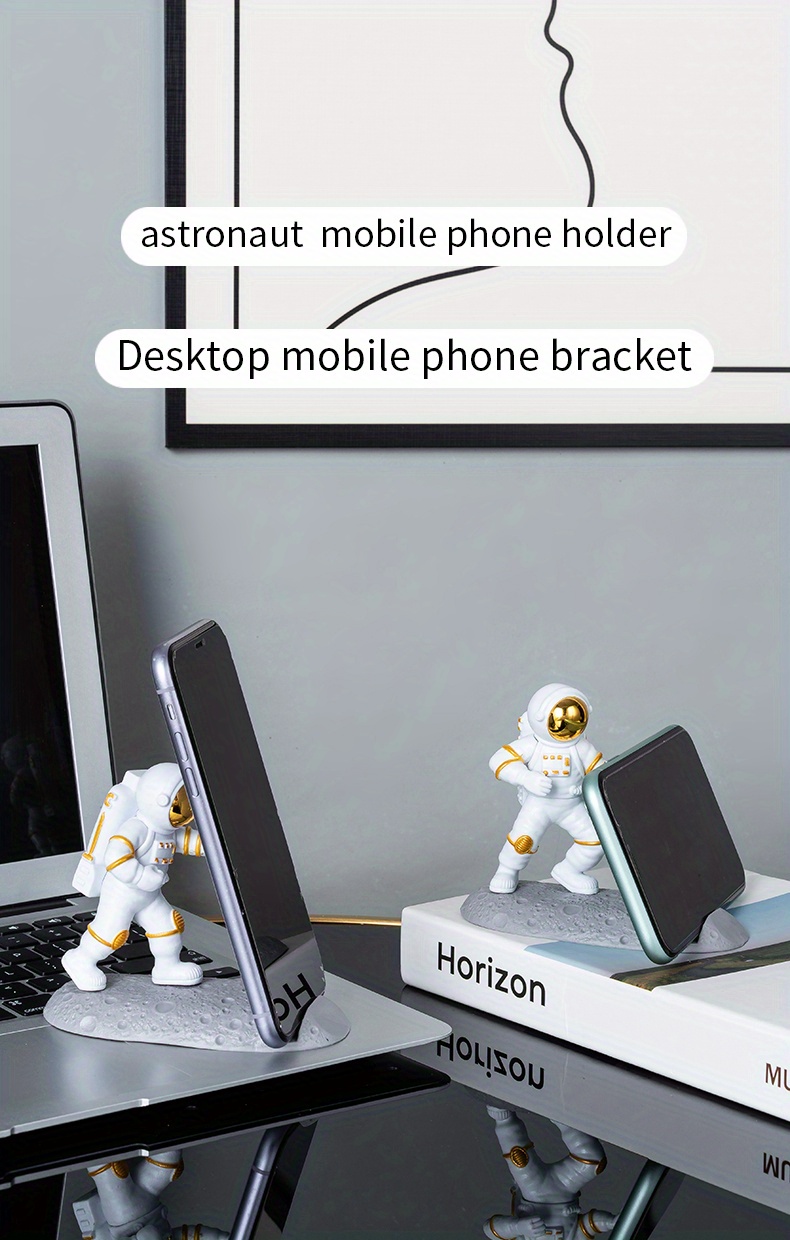 spice up your desk with this astronaut themed phone holder perfect for office decor details 0
