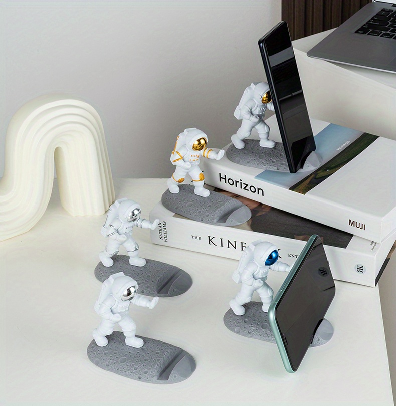 spice up your desk with this astronaut themed phone holder perfect for office decor details 7