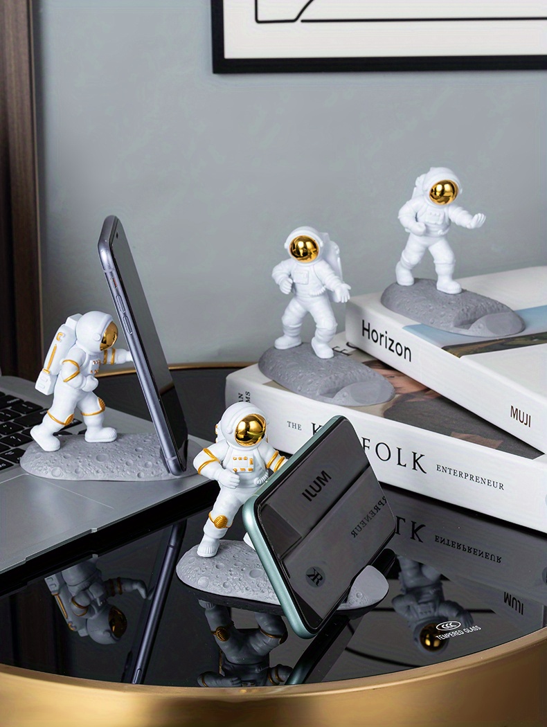 spice up your desk with this astronaut themed phone holder perfect for office decor details 11