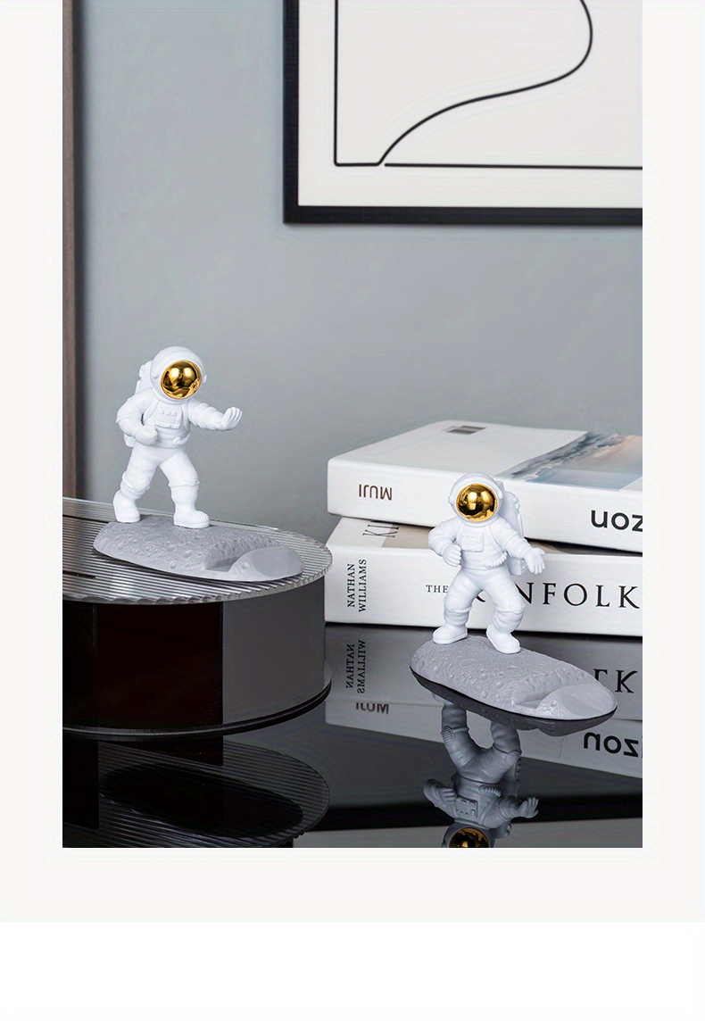 spice up your desk with this astronaut themed phone holder perfect for office decor details 16