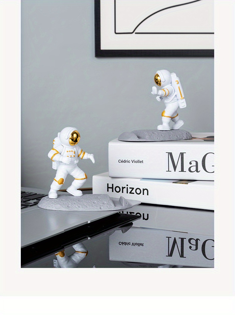 spice up your desk with this astronaut themed phone holder perfect for office decor details 19