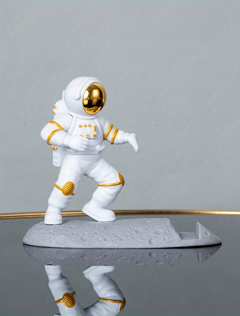 spice up your desk with this astronaut themed phone holder perfect for office decor details 22